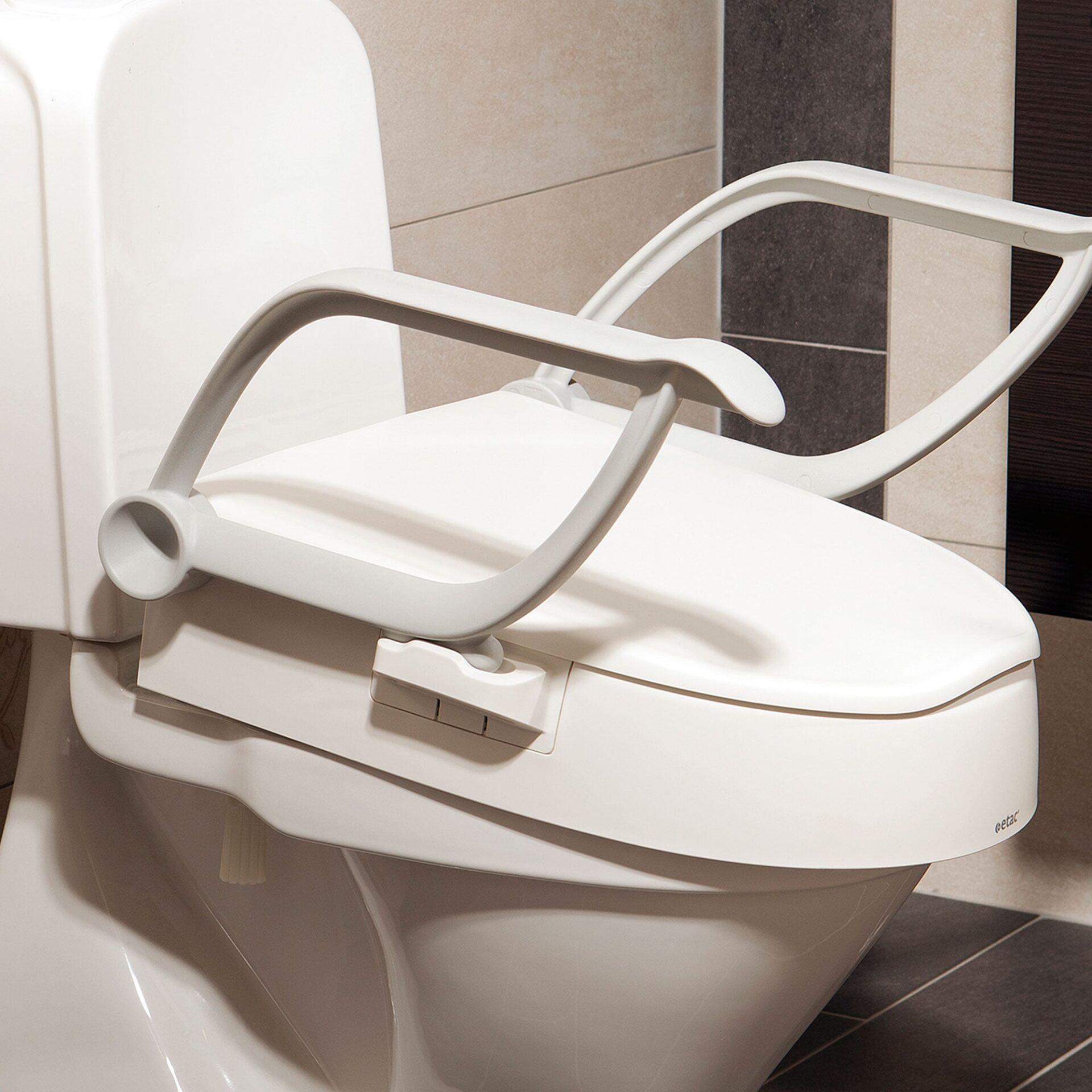 Toilettensitzerhöhung höhenverstellbar – mit Armlehnen und Deckel – Bild 2
